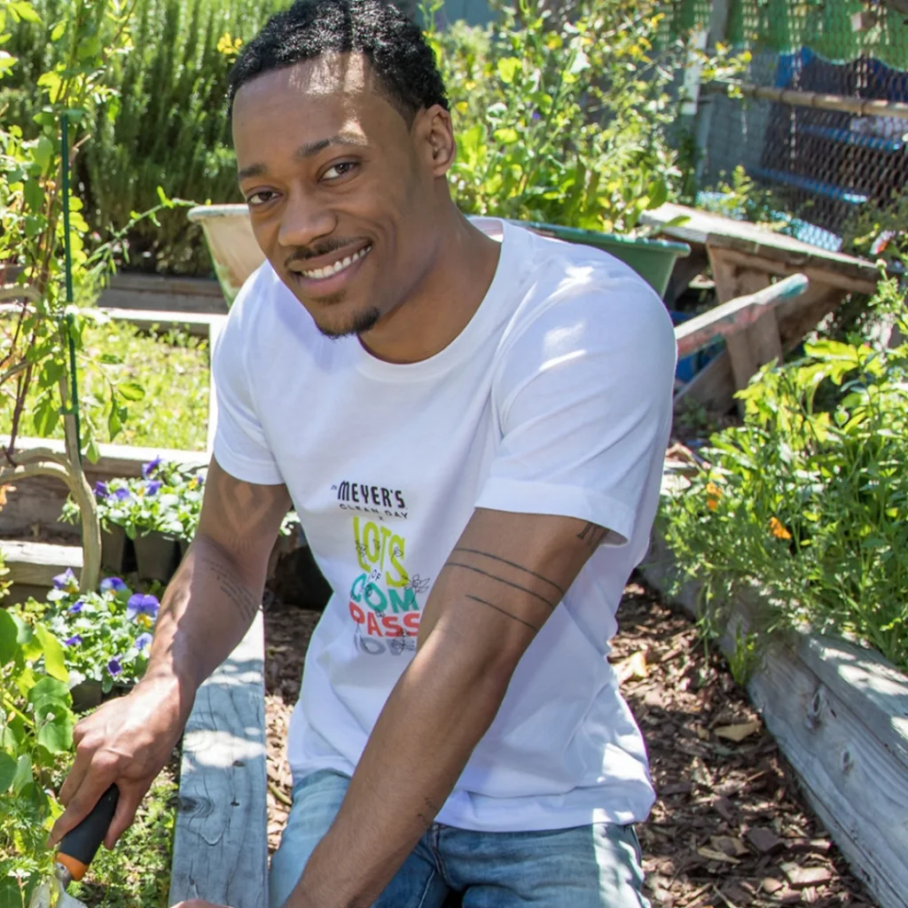 Mrs. Meyer's Clean Day spokesperson in a community garden for the Compassion Flower launch